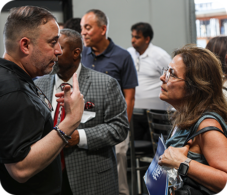 Conference speaker engaging with an audience
